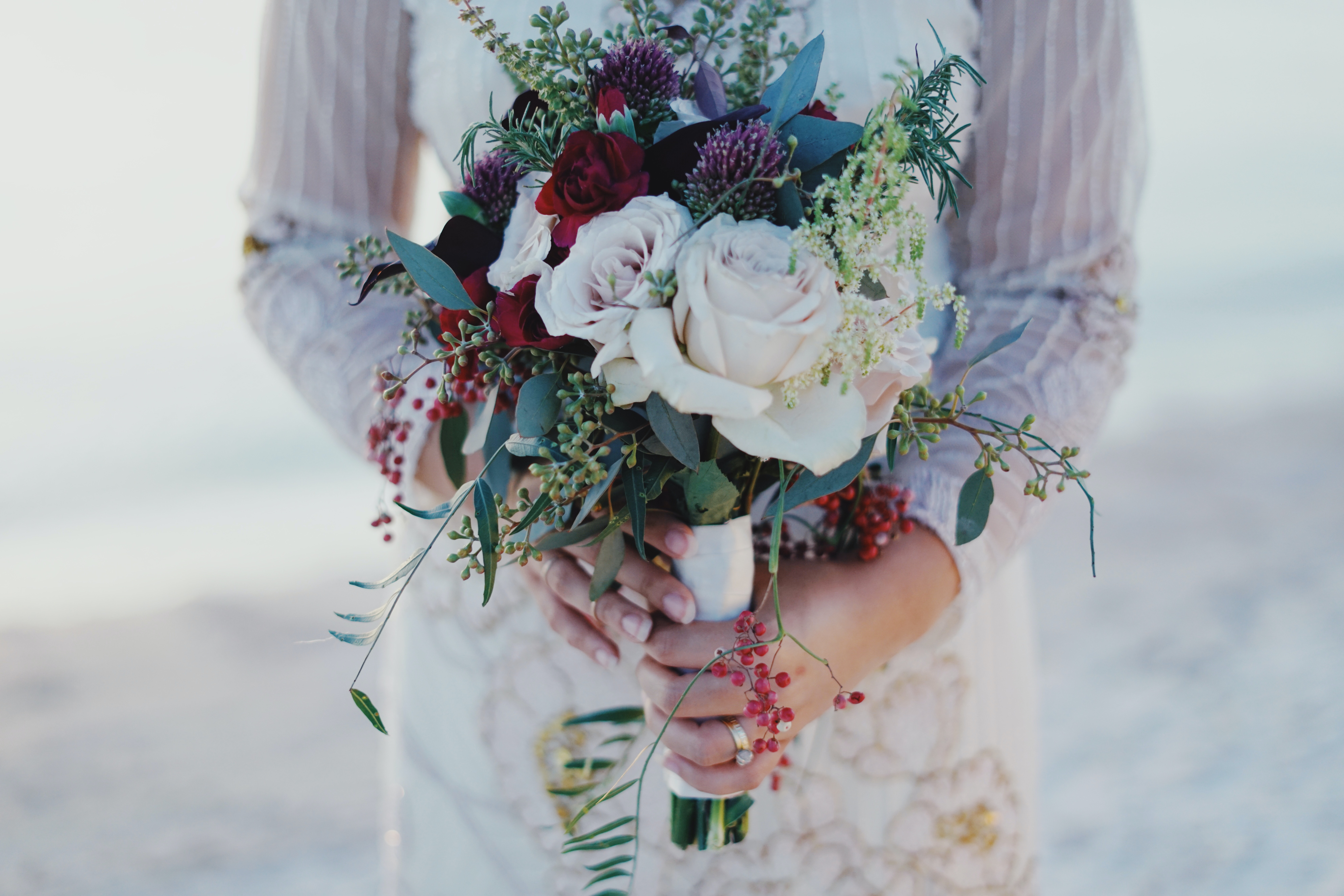 woman-holding-red-and-white-rose-bouquet-759668